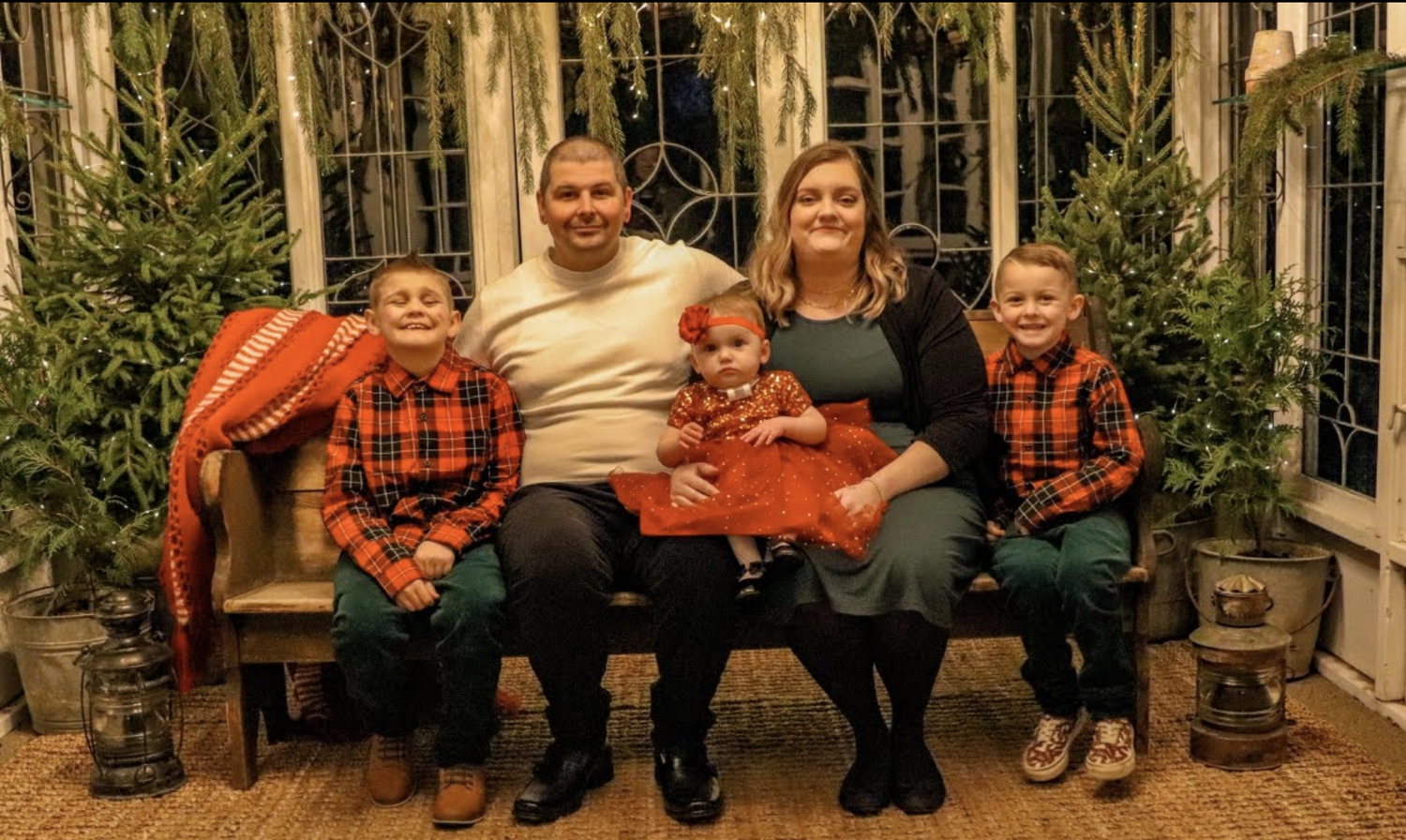 Family photo - recipient of Ainsley's Angels Bunch Bike