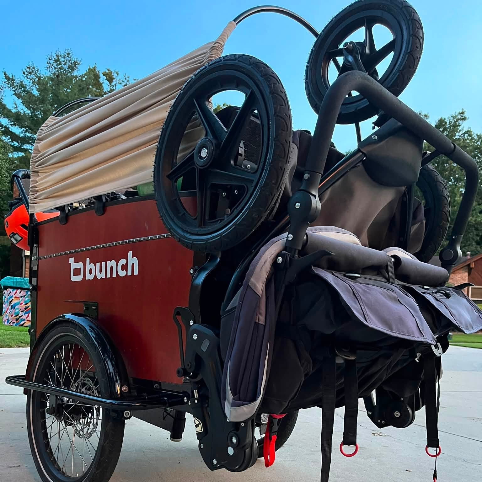 bunch bike with folding stroller on the front panel