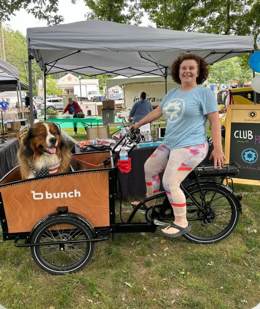 Dog in Original Bunch Bike with owner