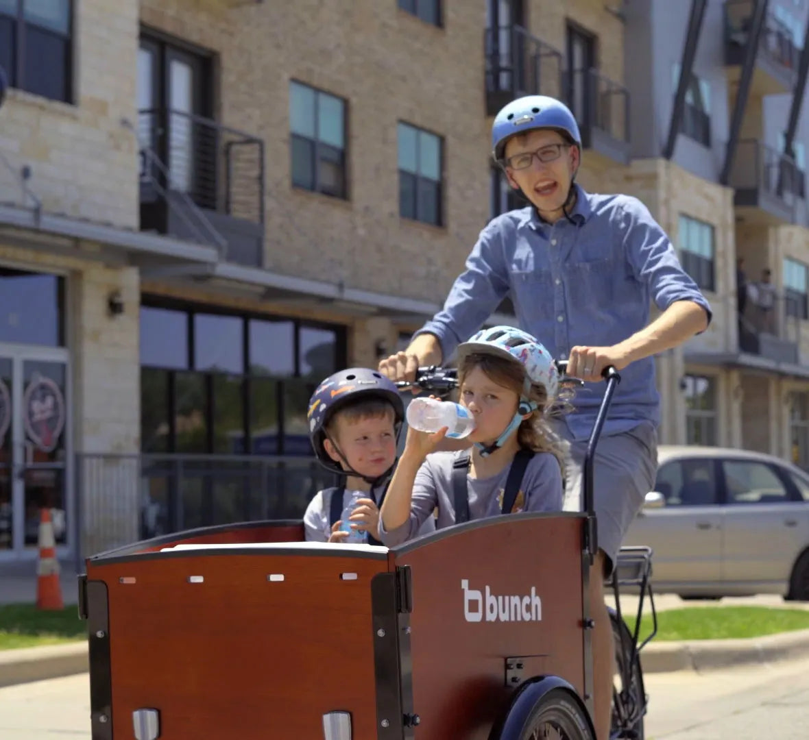 Aaron and Kids Riding Bunch Bike