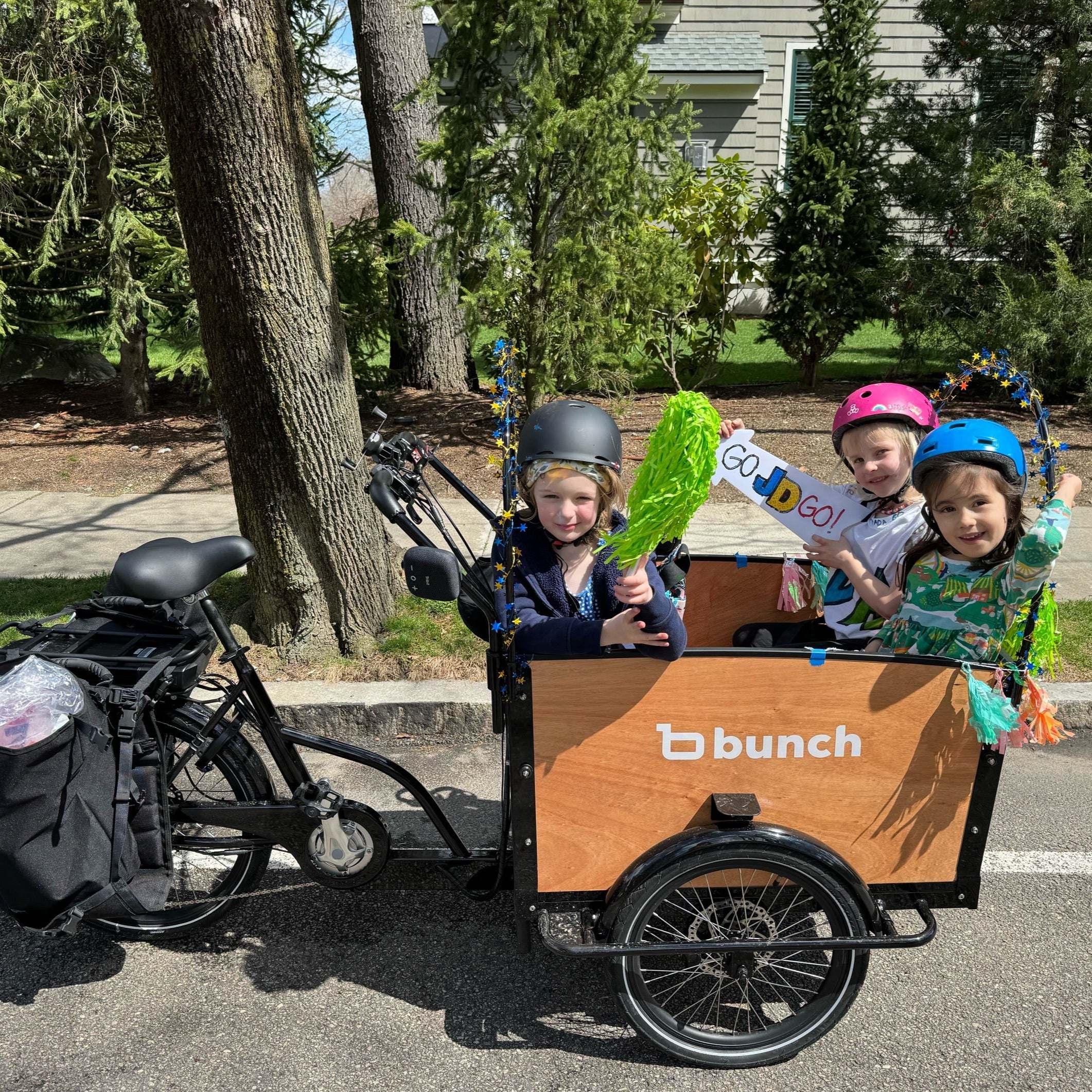 Three kids in Original 4 Bunch Bike - #color_Honey Woodgrain