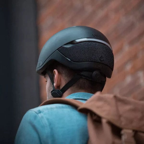 Rear view of cyclist wearing faro smart helmet